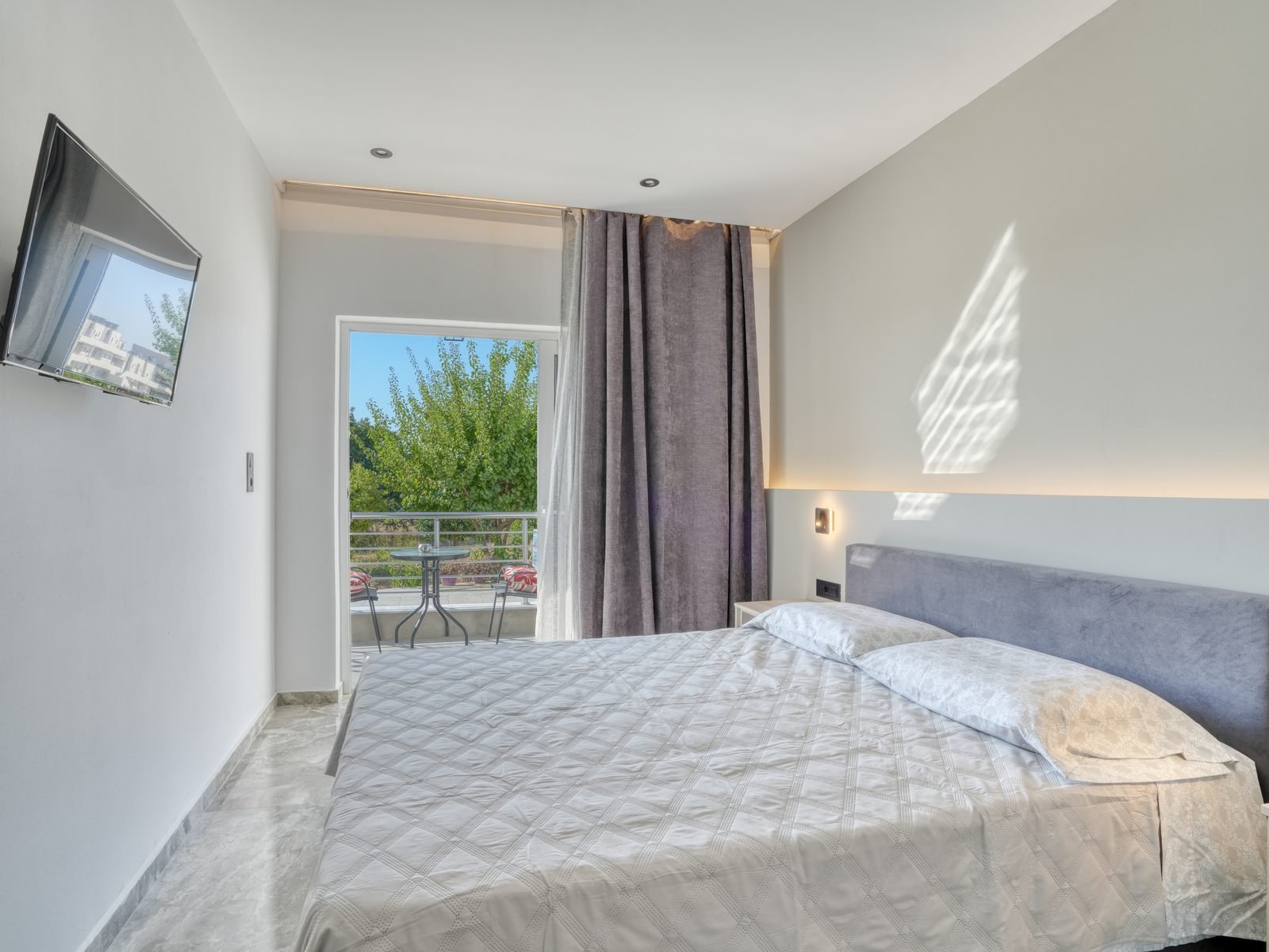 Second bedroom with double bed and balcony