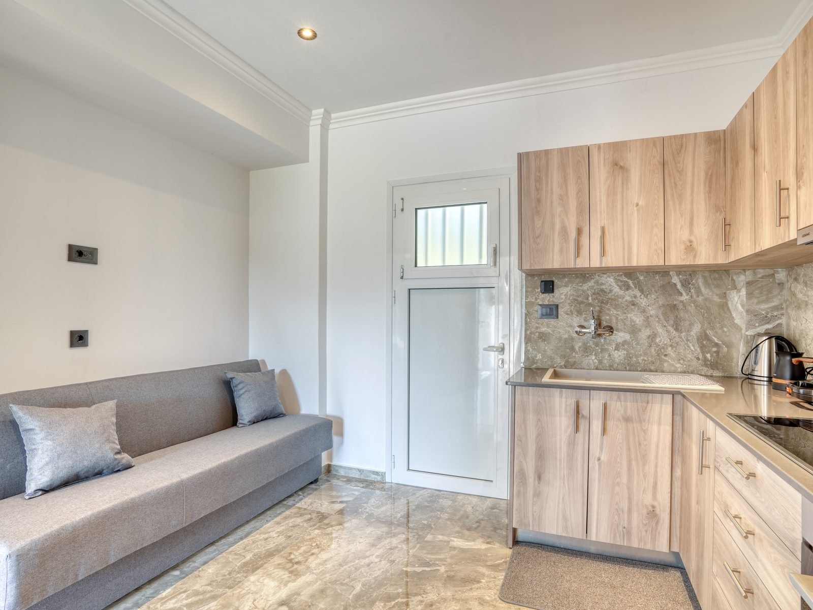 Sea View Apartment — living area and kitchen